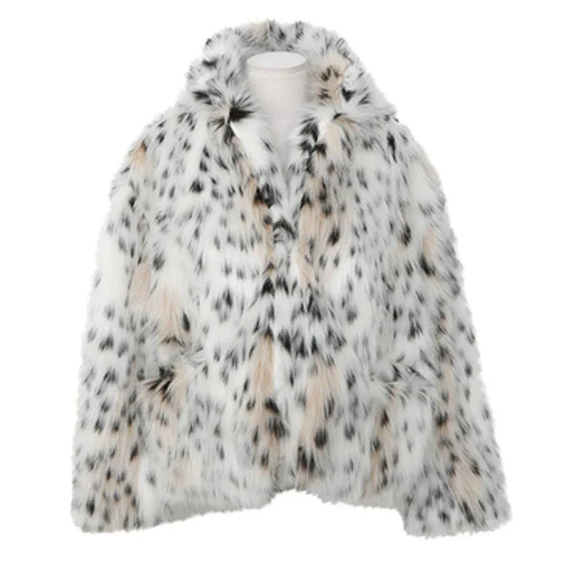 white and beige spotted faux fur coat with black irregular spots on mannequin