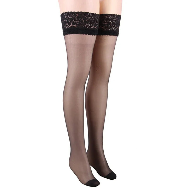 Sheer black thigh-high stockings with lace tops on mannequin legs against white background
