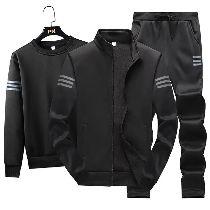 Black men's three-piece tracksuit set with zip jacket, sweatshirt, and pants featuring gray stripes on sleeves and leg