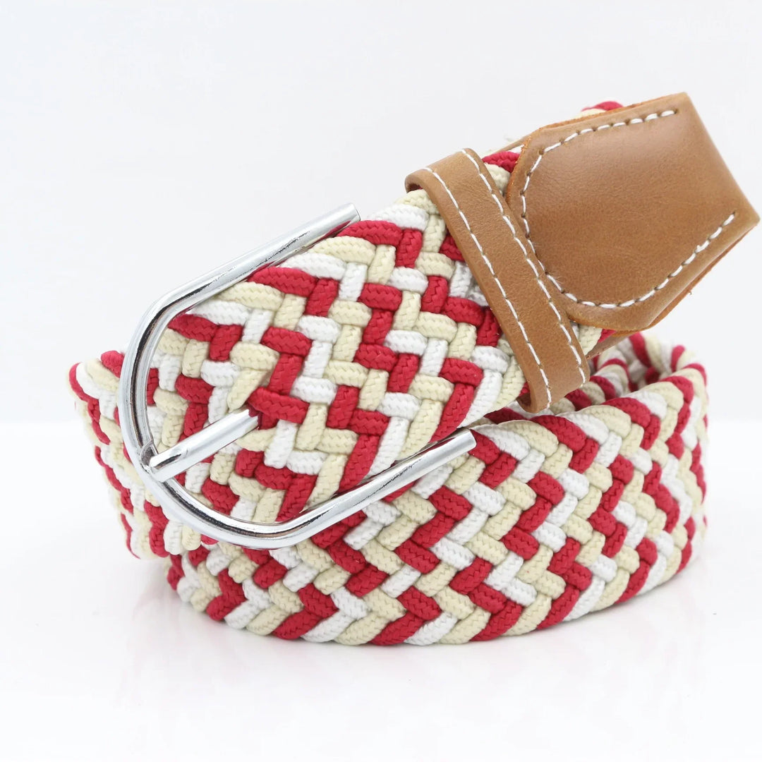 woven fabric belt with red, beige, and white pattern and brown leather buckle end