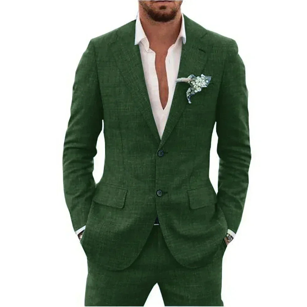 Man wearing a stylish green suit with a white shirt and floral lapel pin