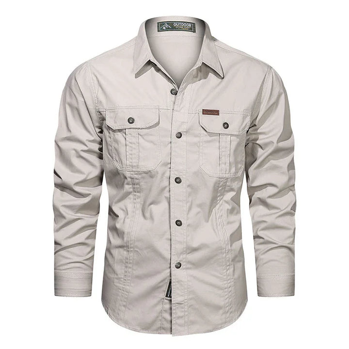 Beige long-sleeve outdoor shirt with buttoned chest pockets and collar on white background