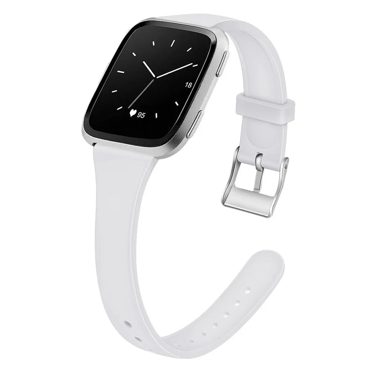 Silver smartwatch with white silicone band showing analog clock and heart rate 95 bpm on screen