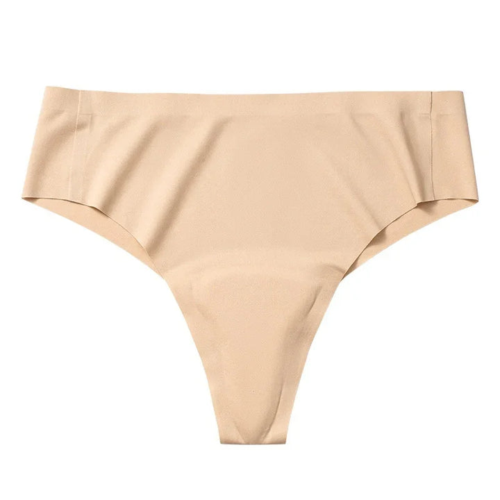 Beige seamless thong underwear on white background, smooth fabric women's lingerie