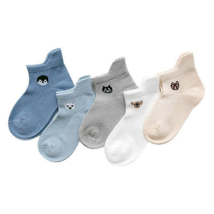 Set of five colorful ankle socks with cute animal face designs on each pair, on white background