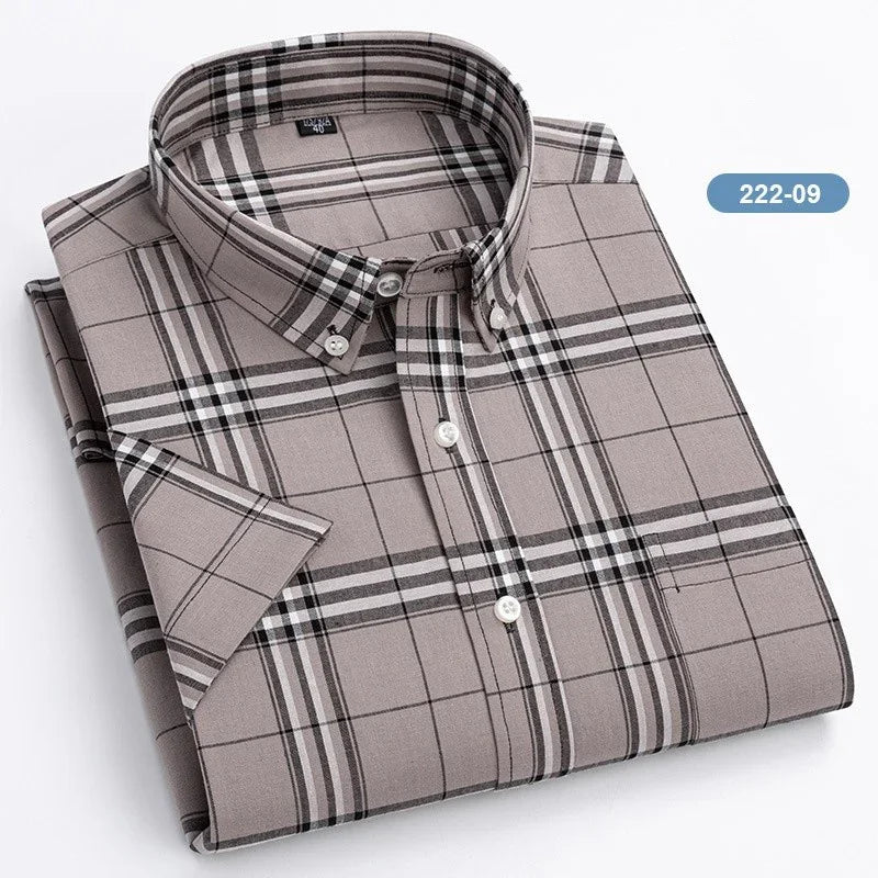 Folded short-sleeve button-down plaid shirt in brown and black tones