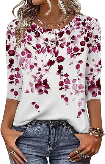 woman wearing white long sleeve blouse with purple floral print and blue jeans