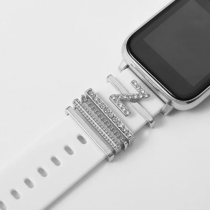 Smartwatch with white silicone band decorated with silver rhinestone alphabet letter charms and bars