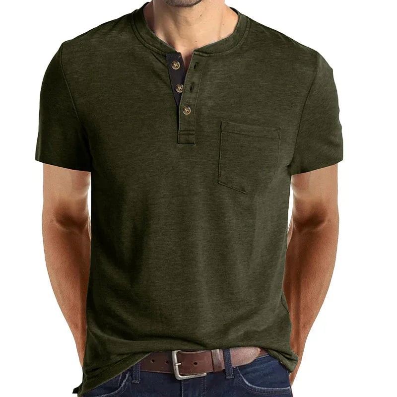 Men's olive green short sleeve henley shirt with pocket and button placket, paired with jeans