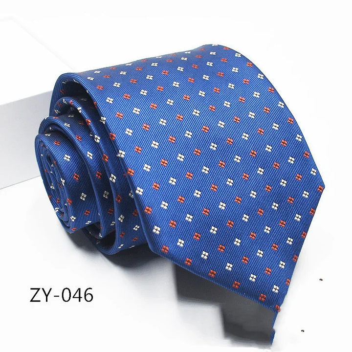 Blue silk necktie with red and white small square pattern, rolled up on white background, code ZY-046