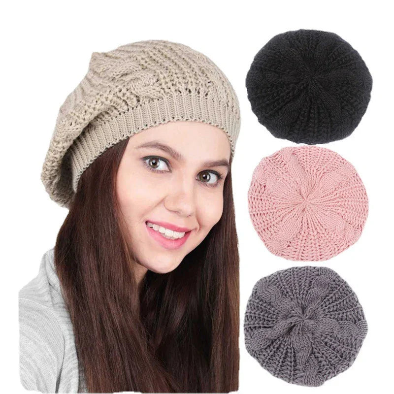 Woman wearing beige knit slouchy beret with black, pink, and gray knit berets on white background