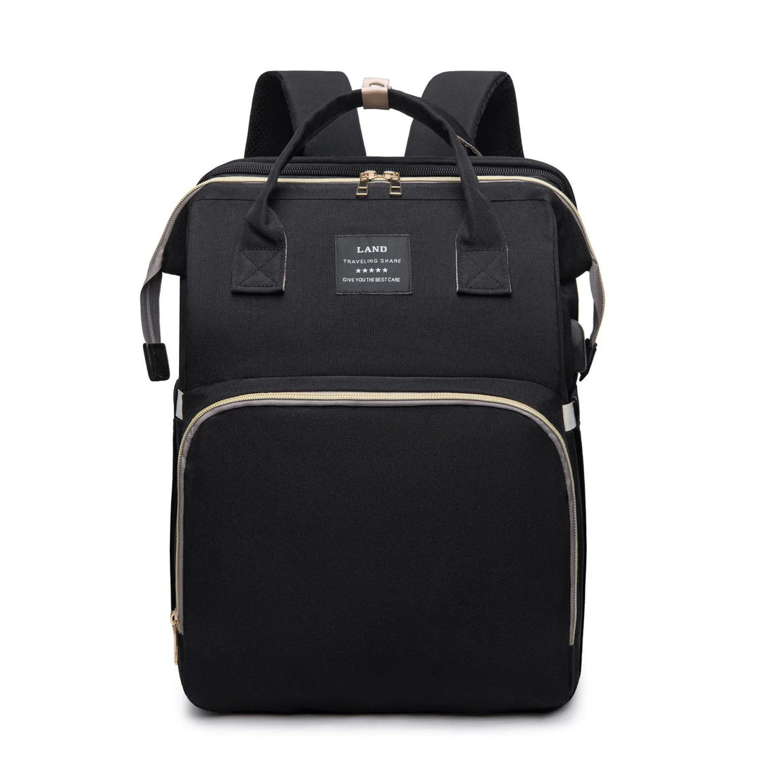 Black travel backpack with beige zippers, top handles and front pocket, laptop bag with USB port