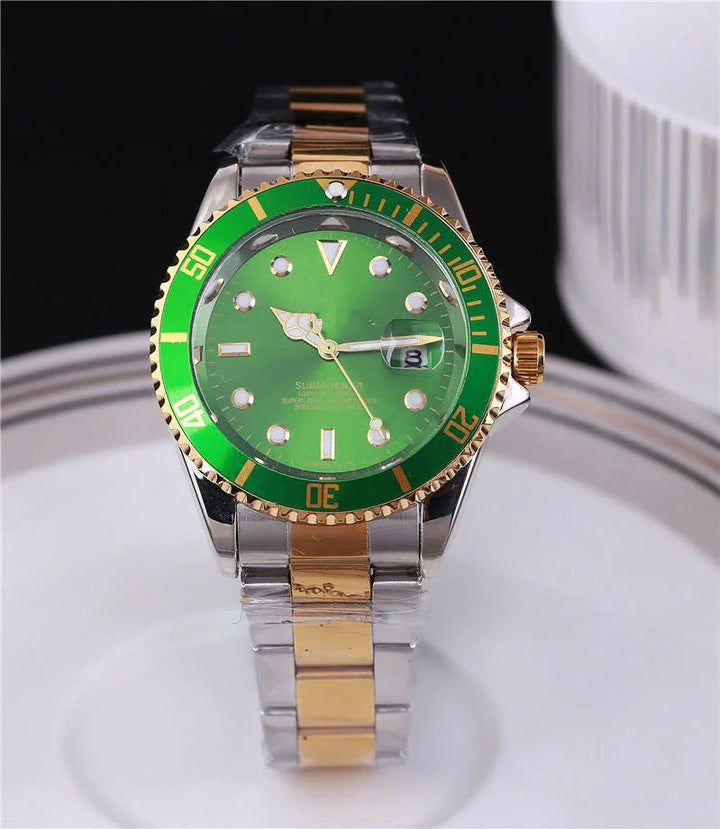 Luxury wristwatch with green bezel and dial, gold and silver metal band, date display