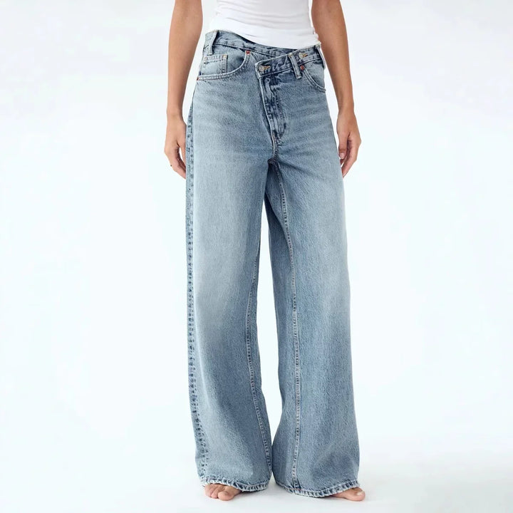 Woman wearing light blue wide-leg denim jeans with double waist button detail