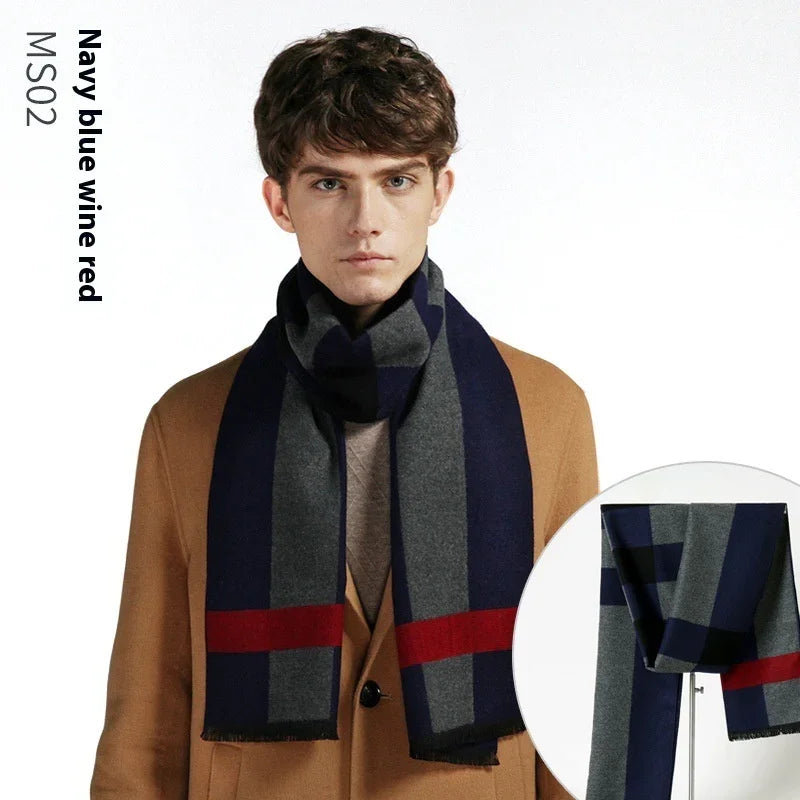 Man wearing navy blue, grey, and wine red colorblock scarf with camel coat on white background