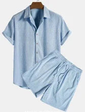 Light blue short-sleeve button-up shirt with matching elastic waist shorts on hanger