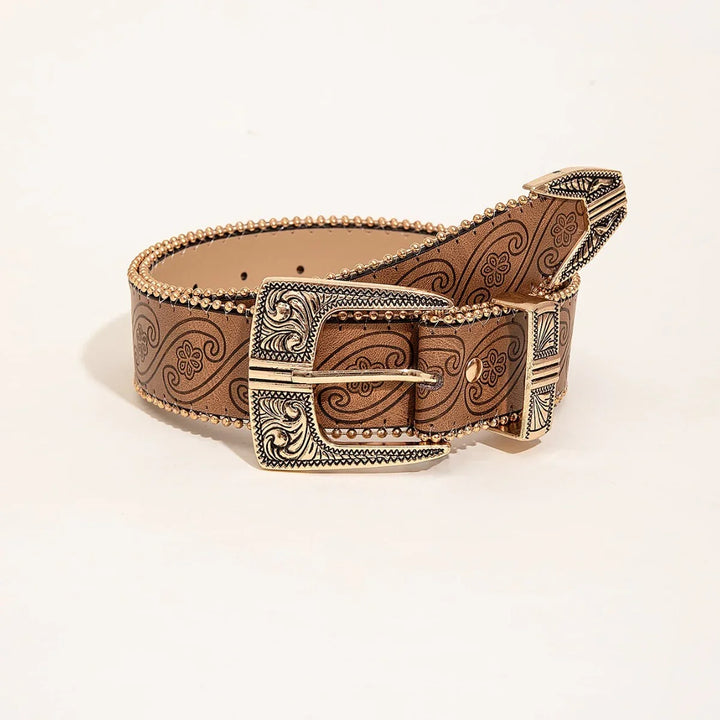 Brown leather belt with embossed floral pattern and ornate engraved silver buckle