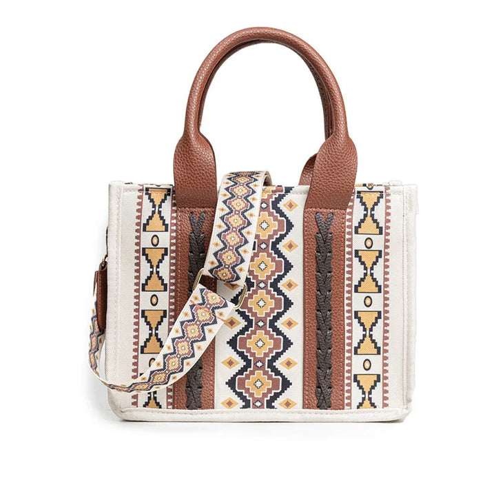 Boho tote bag with geometric Aztec patterns, brown leather handles, and matching adjustable strap