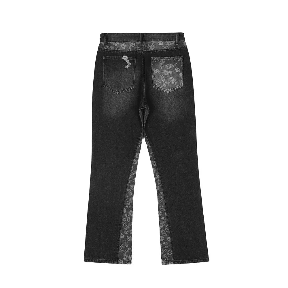 Black denim jeans with paisley pattern on back pocket, waistband, and inner leg panels