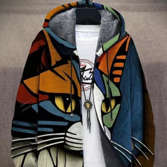 Colorful cat face design on a hooded jacket with a white T-shirt underneath featuring a circular logo and pendant necklace