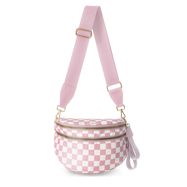 Pink and white checkered crossbody bag with double gold zippers and wide adjustable strap