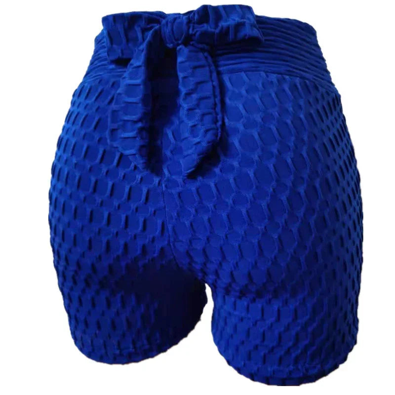 Blue textured high-waisted workout shorts with waistband tie, honeycomb pattern