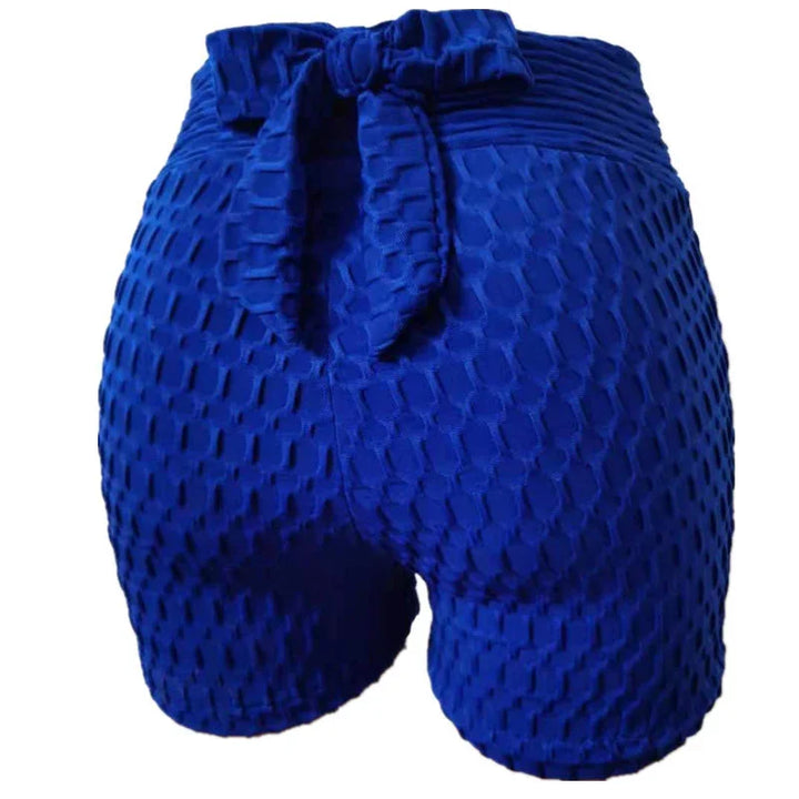 Blue textured high-waisted workout shorts with waistband tie, honeycomb pattern