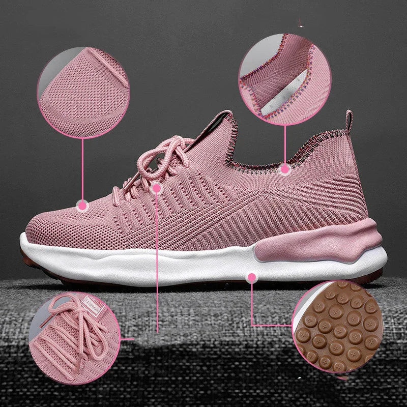 Pink knitted running shoe with white sole and brown textured grip sole details