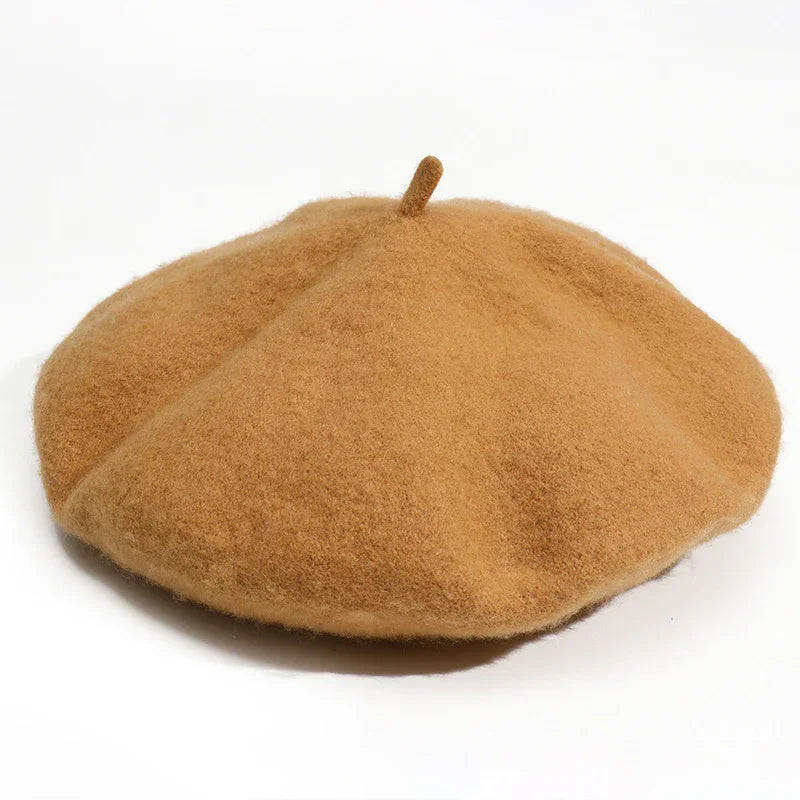 Soft camel brown wool beret hat with classic shape and top stalk detail