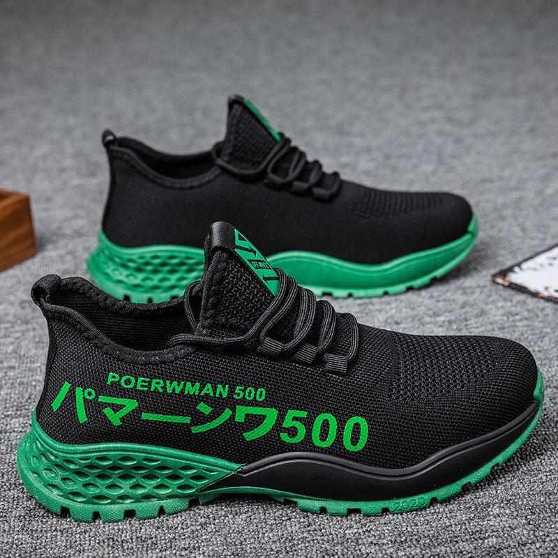 Black and green mesh running shoes with POERWMAN 500 text and cushioned green sole on gray surface