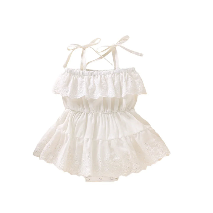White baby girl sleeveless dress with eyelet ruffles and bow tie straps