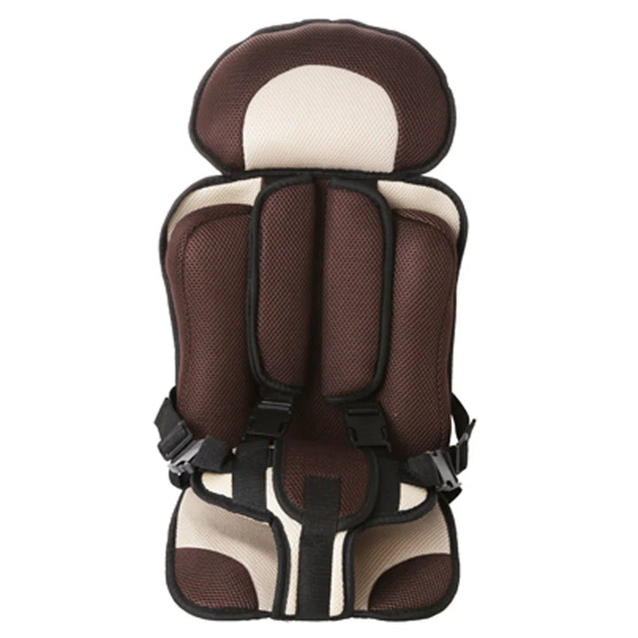 Brown and beige cushioned child safety car seat with adjustable straps and buckles