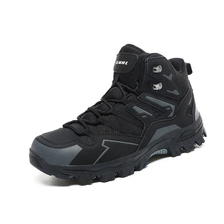 Black high-top hiking boot with rugged sole and lace-up design, featuring gray accents and fabric upper