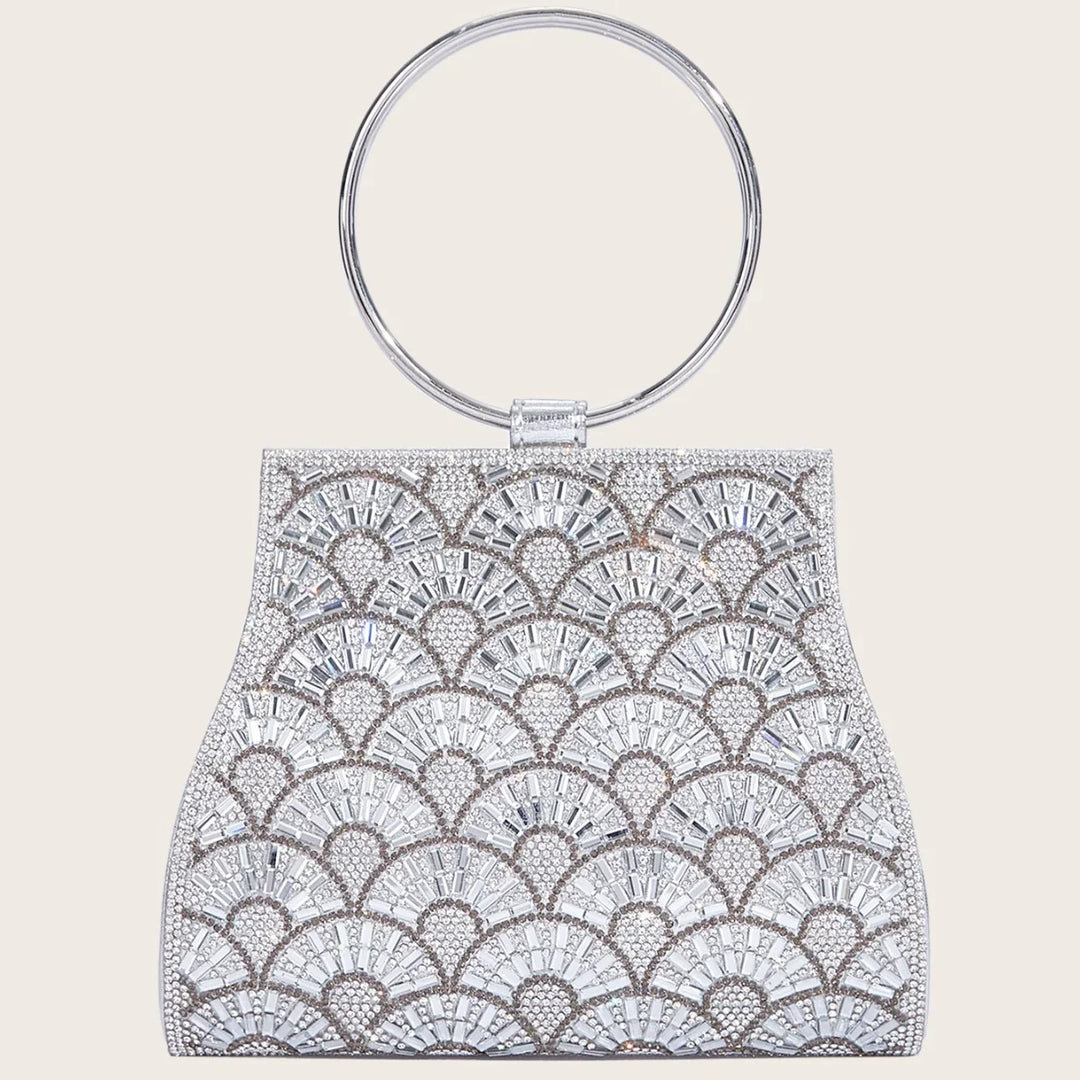 Silver evening clutch bag with geometric rhinestone pattern and round metal handle
