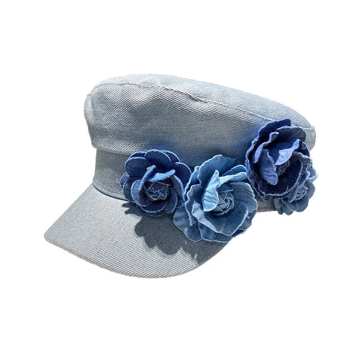 Light blue denim military-style cap with three denim fabric flower embellishments on the side
