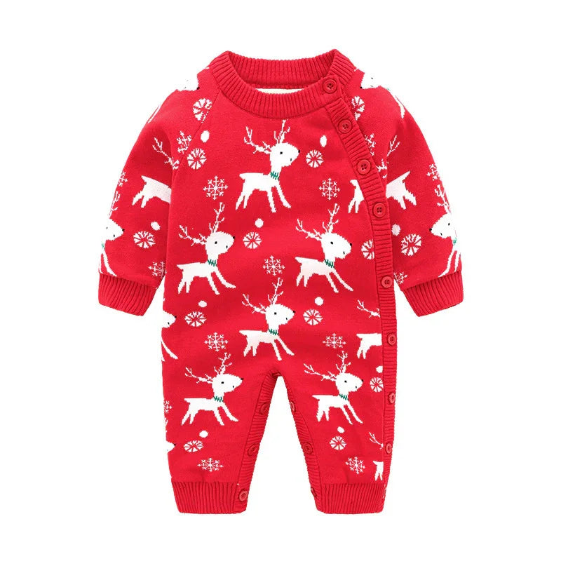 Red baby onesie with white reindeer and snowflake Christmas pattern, button closure