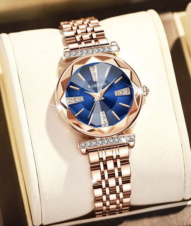 Rose gold KABIFAN wristwatch with blue dial and crystal accents on bracelet and face