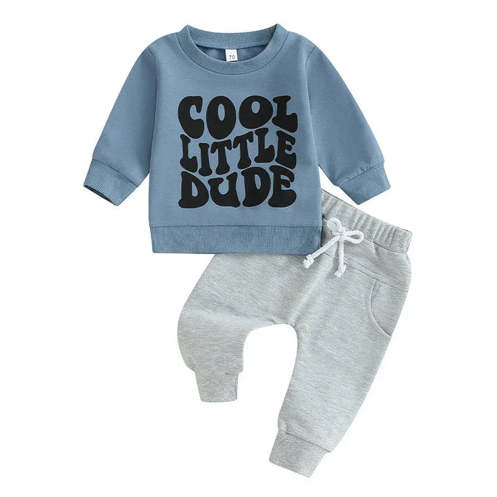 Blue toddler sweatshirt with black "Cool Little Dude" text and gray drawstring jogger pants set