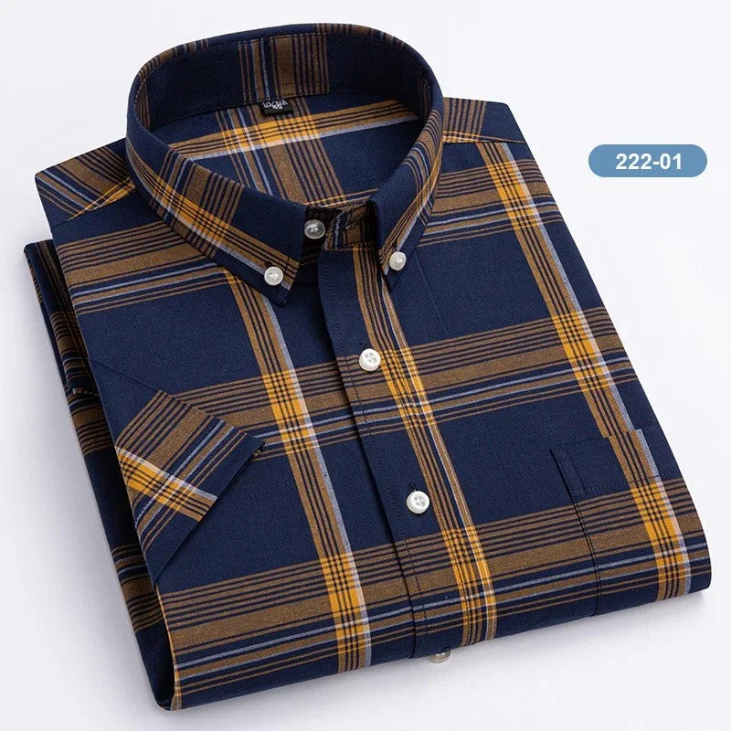 Folded navy blue plaid button-down shirt with yellow and brown stripes, short sleeves