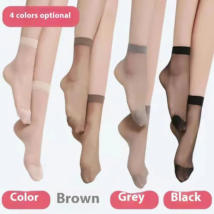 Four pairs of sheer ankle socks in color options: nude, brown, grey, and black on legs