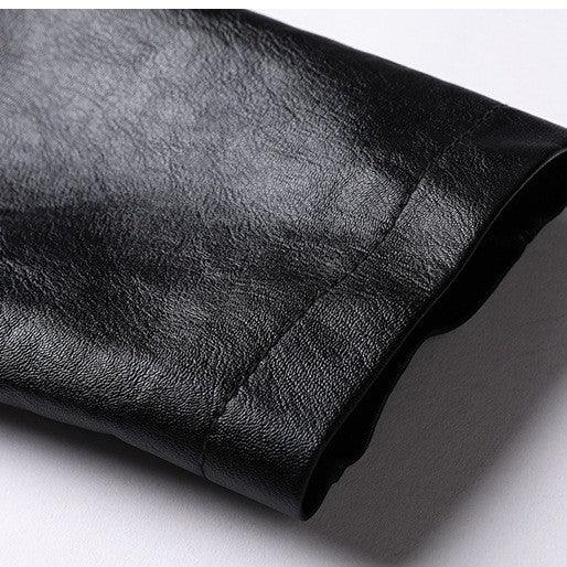 Close-up of black leather sleeve with smooth texture and subtle stitching detail
