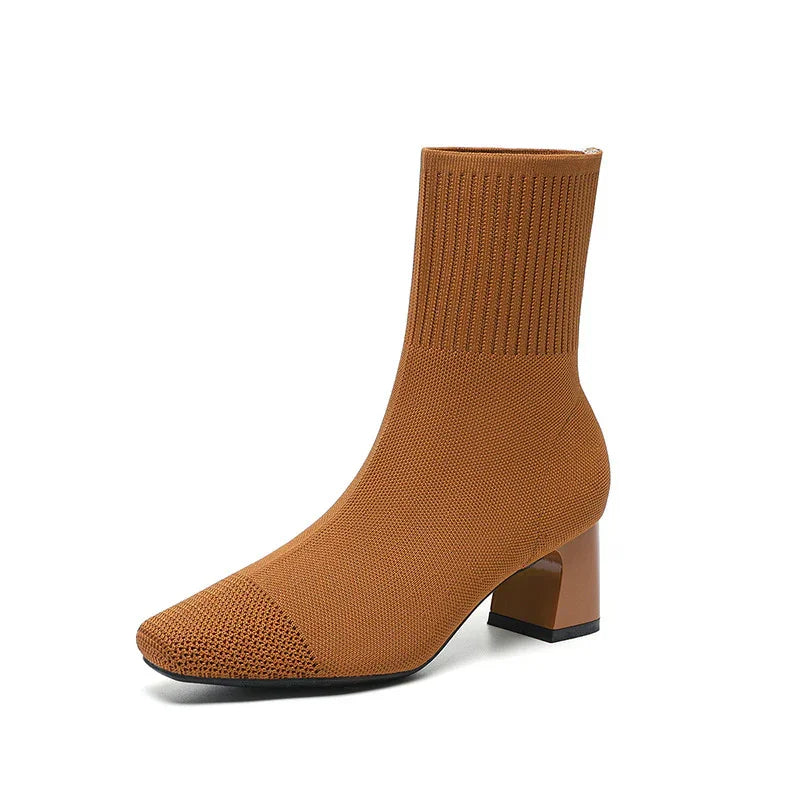 Brown knitted ankle boot with block heel and ribbed cuff on white background