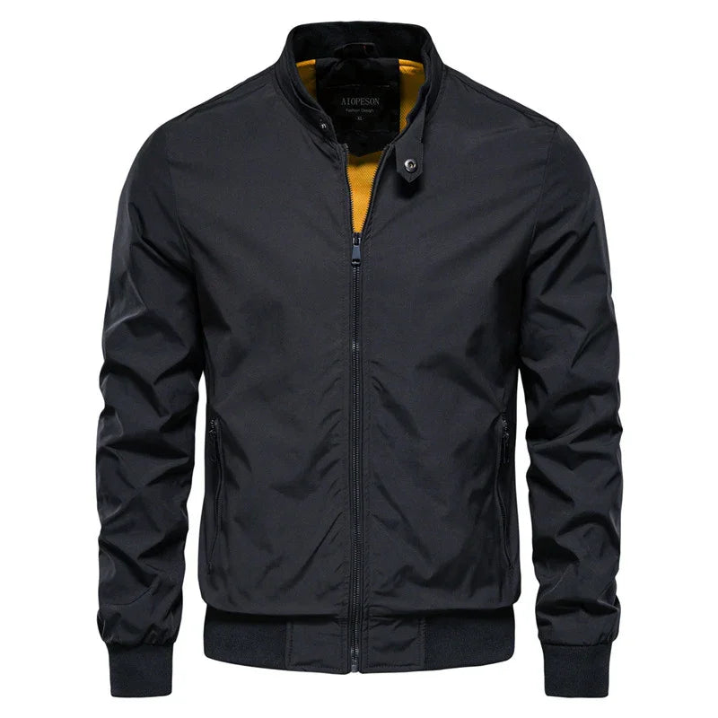 black men's bomber jacket with front zipper, snap collar, and yellow inner lining