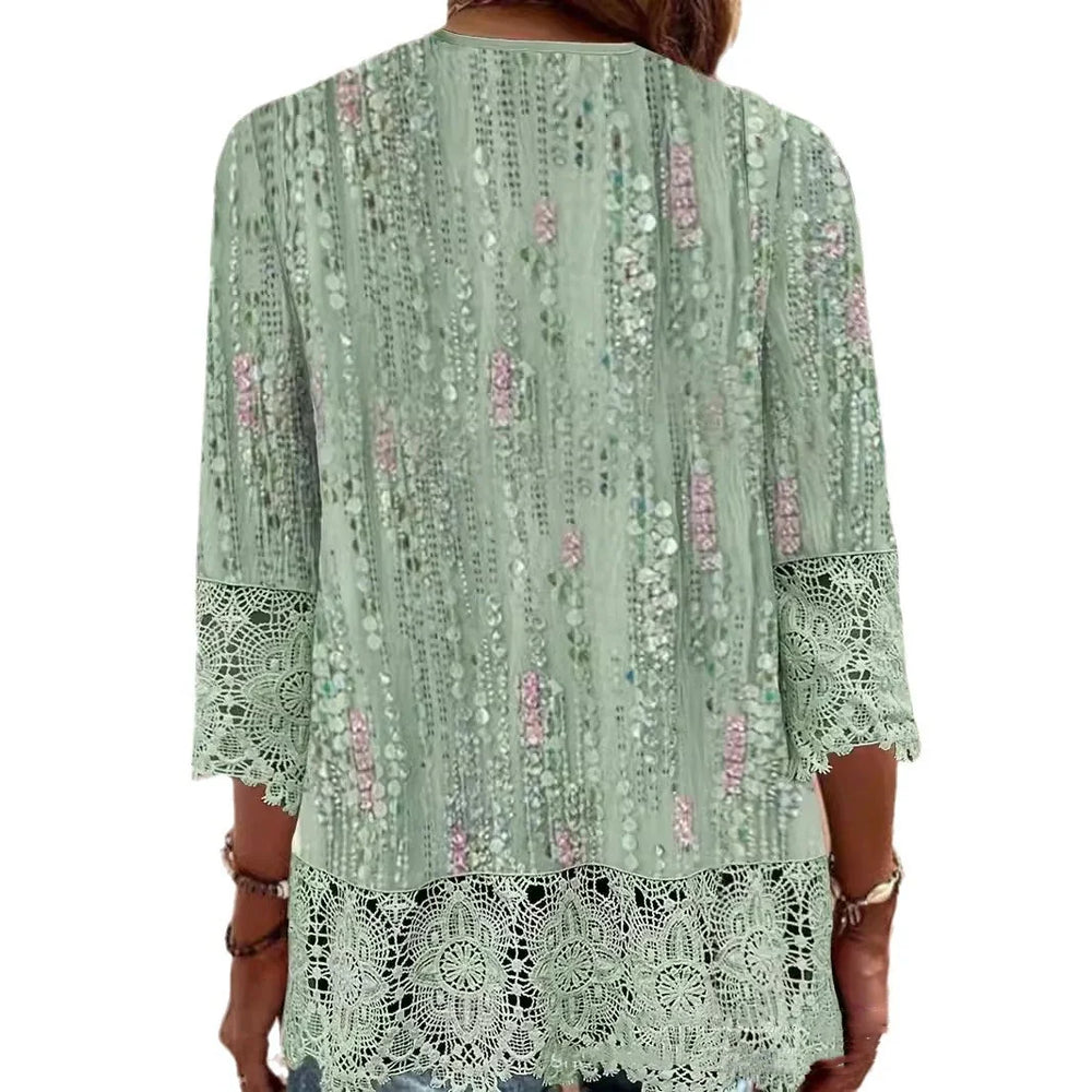 Back view of woman wearing light green floral lace trim cardigan with 3/4 sleeves