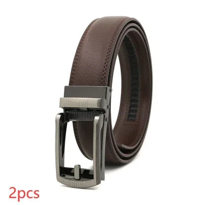 Brown leather men's belt with silver metal buckle rolled up on white background