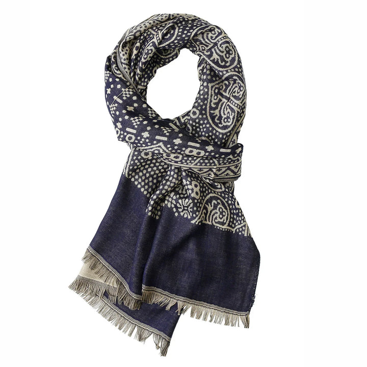 Navy blue scarf with intricate white paisley and polka dot patterns, fringed edges