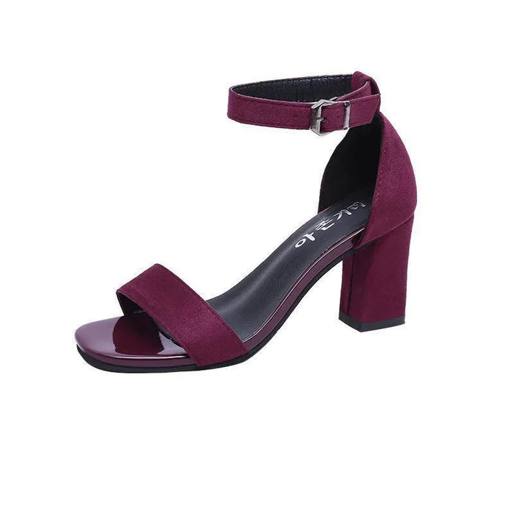 Burgundy suede block heel sandal with ankle strap and open toe on white background
