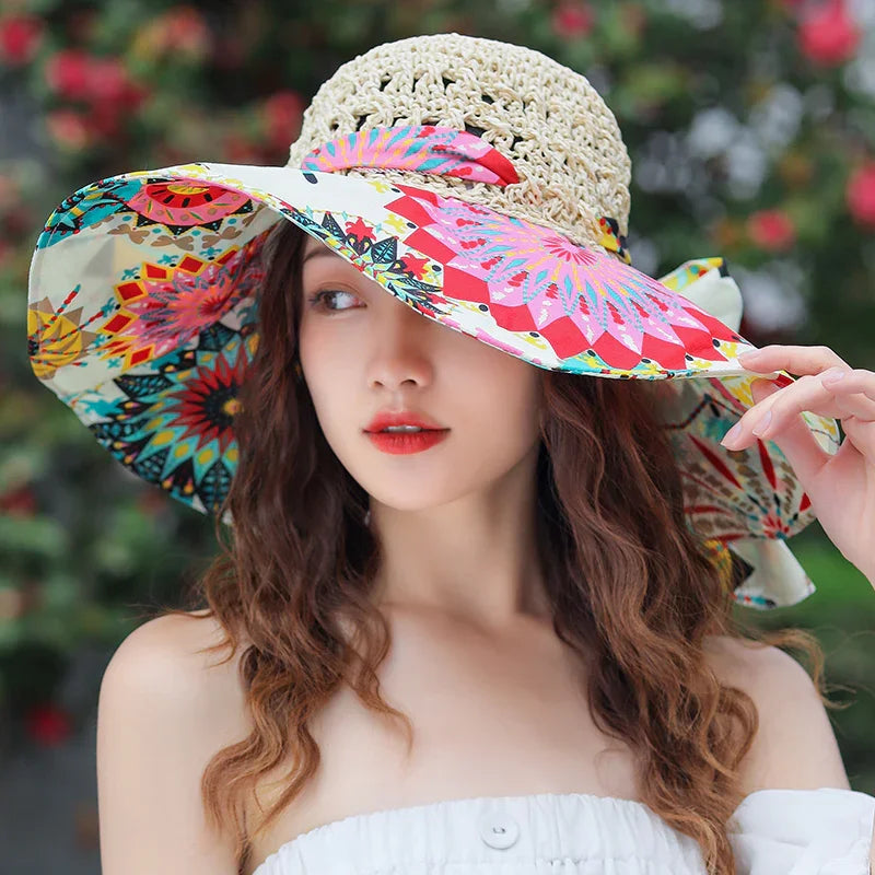 Young woman wearing a colorful wide-brim sun hat with floral pattern outdoors