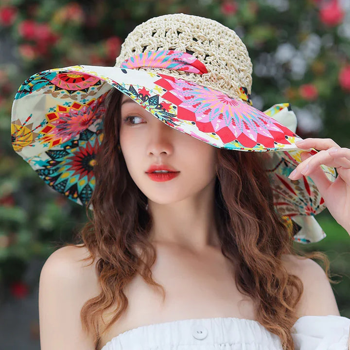 Young woman wearing a colorful wide-brim sun hat with floral pattern outdoors