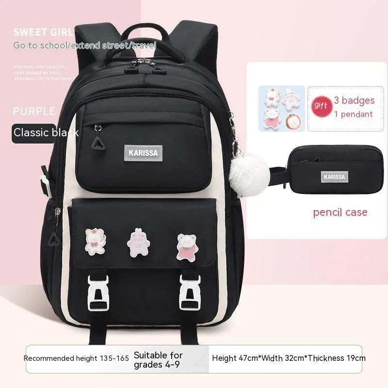 Black KARISSA school backpack with white trim, three cute bear badges, and matching pencil case with fluffy keychain